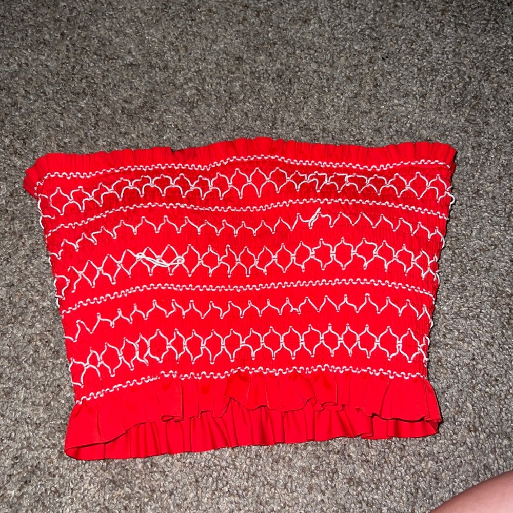 Red cropped fitted tube top.